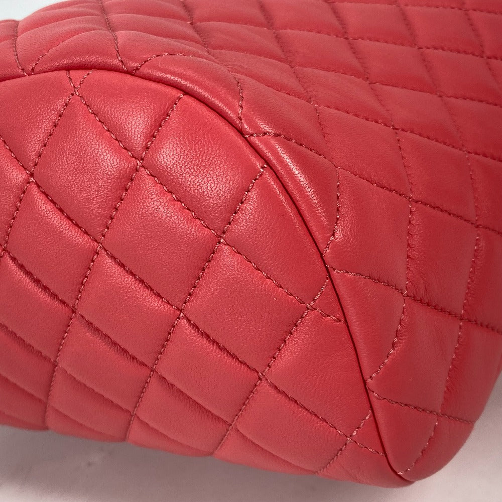 Close-up of a red quilted handbag