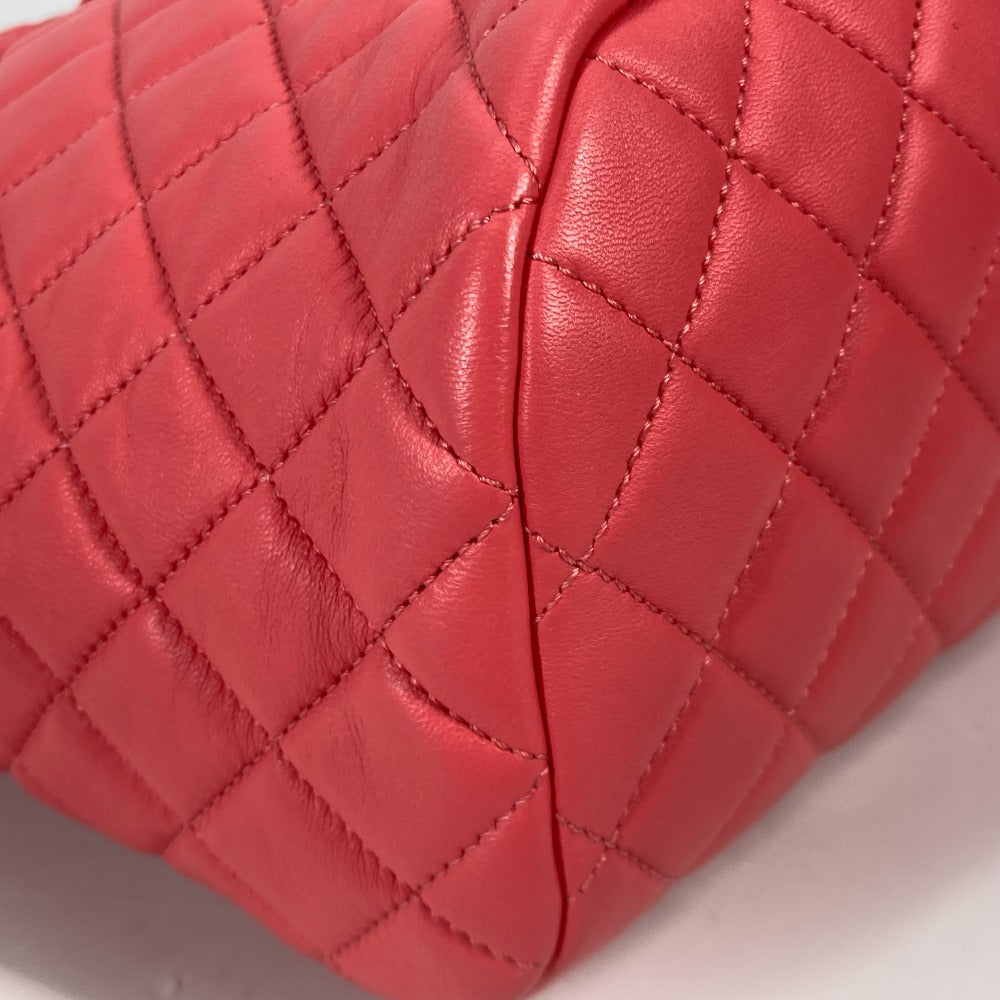 Close-up of a red quilted handbag