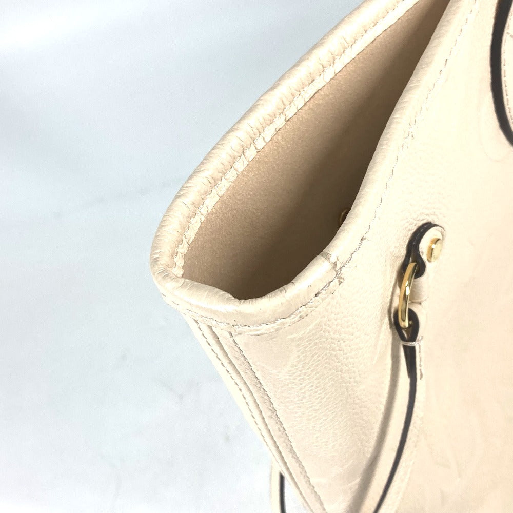 top edge Louis Vuitton Empreinte Monogram Neverfull MM Cream