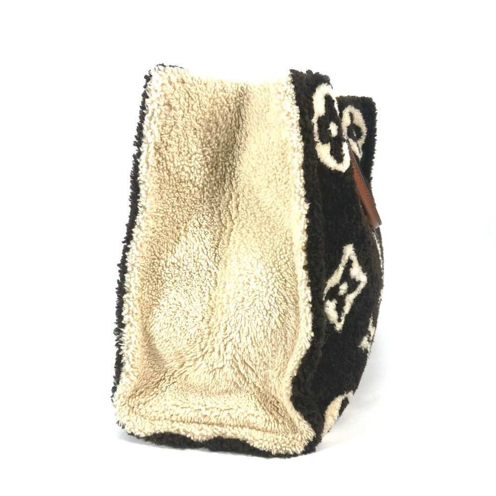 side Louis Vuitton Shearling Monogram On The Go GM Black and White