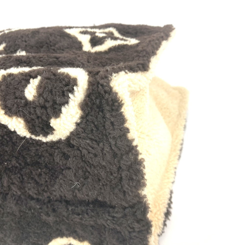 corner Louis Vuitton Shearling Monogram On The Go GM Black and White