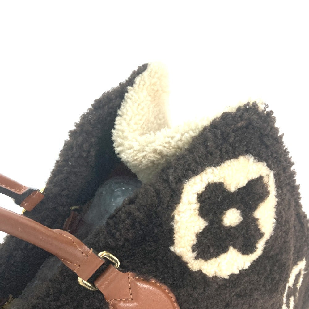 top edge Louis Vuitton Shearling Monogram On The Go GM Black and White