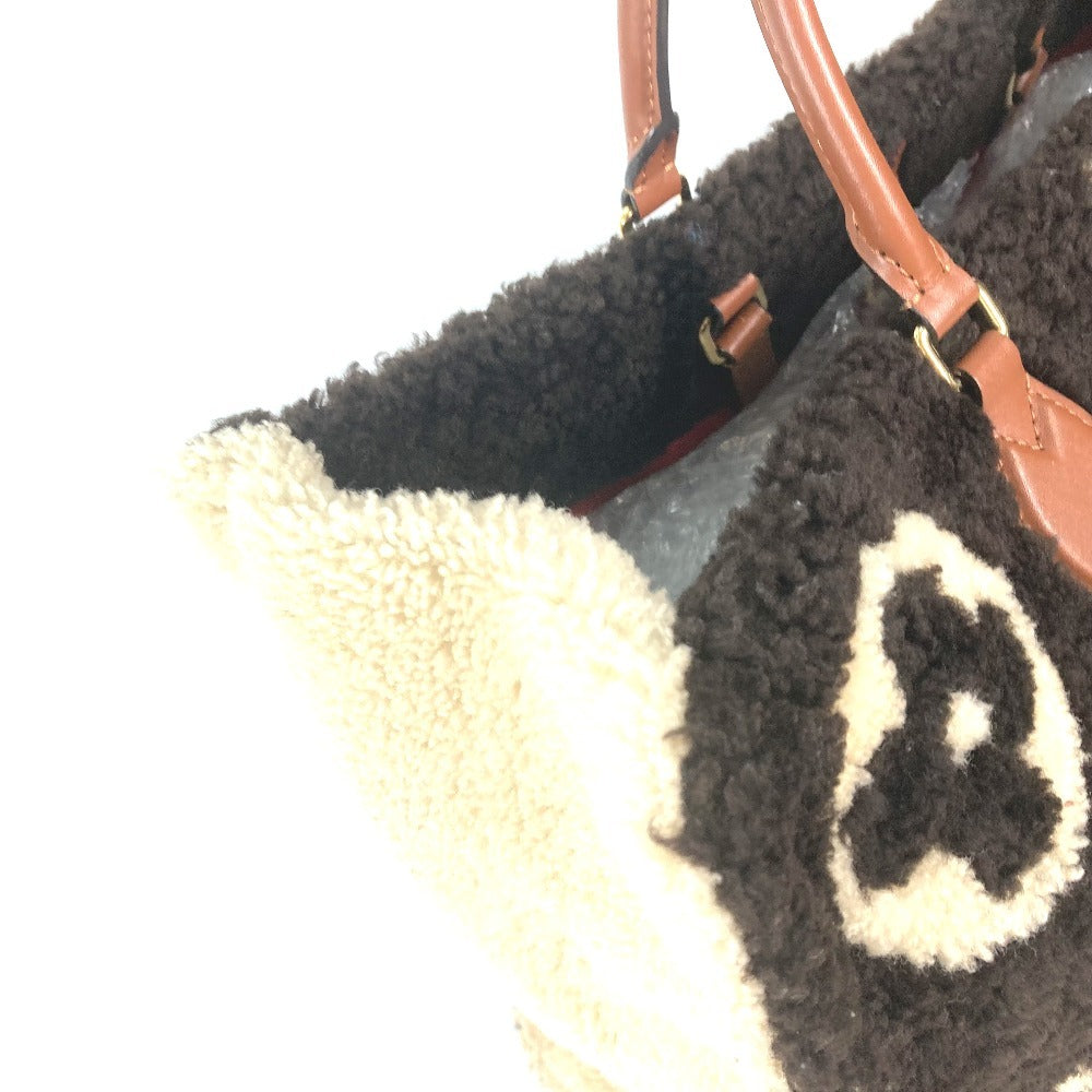 edge Louis Vuitton Shearling Monogram On The Go GM Black and White