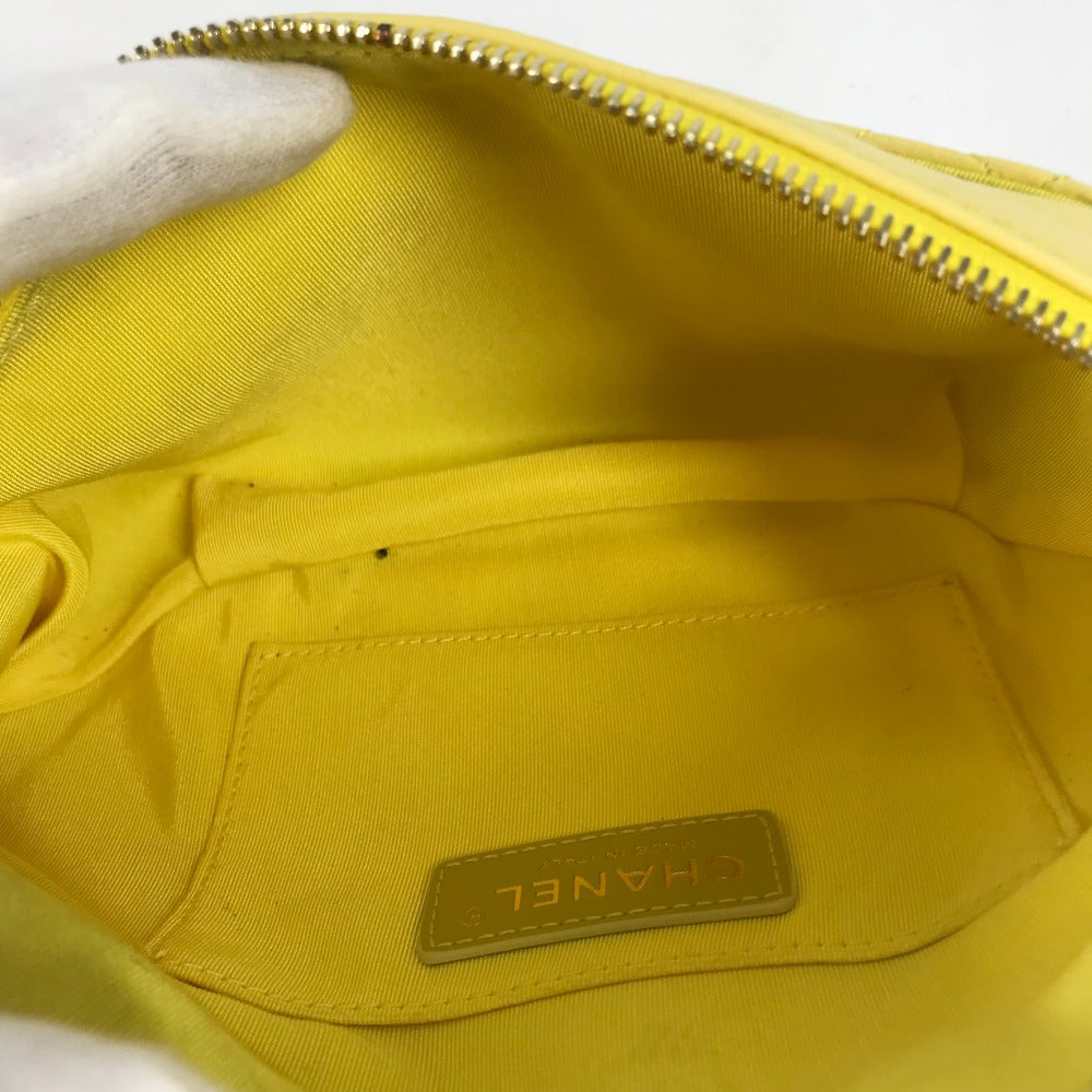 Yellow bag interior with visible Chanel logo