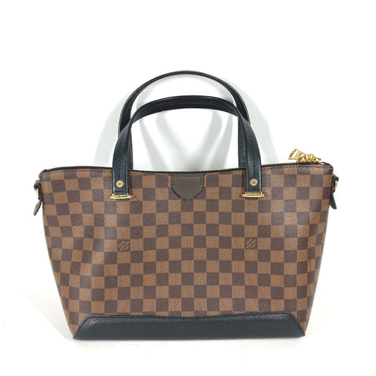 Brown checkered handbag with black accents on a white background