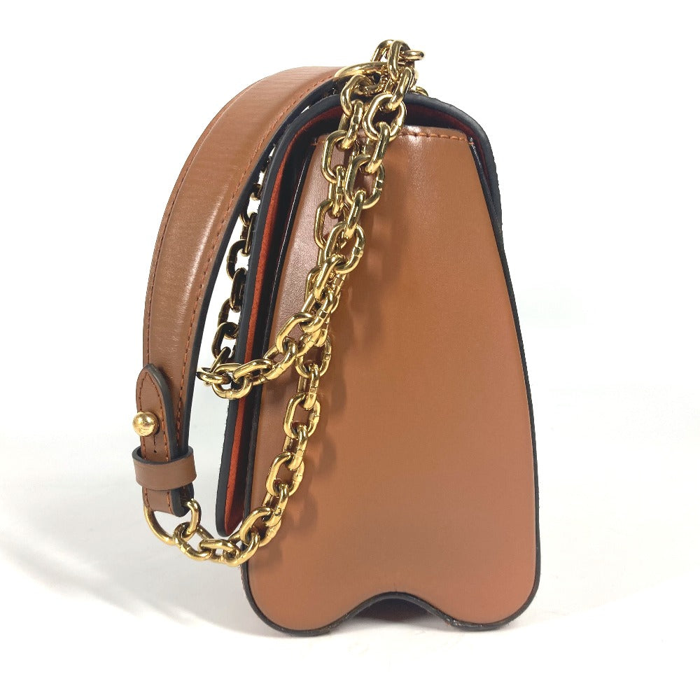 Brown handbag with gold chain strap on a white background