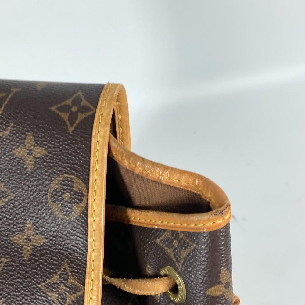 Close-up of a brown leather Louis Vuitton bag with monogram pattern.