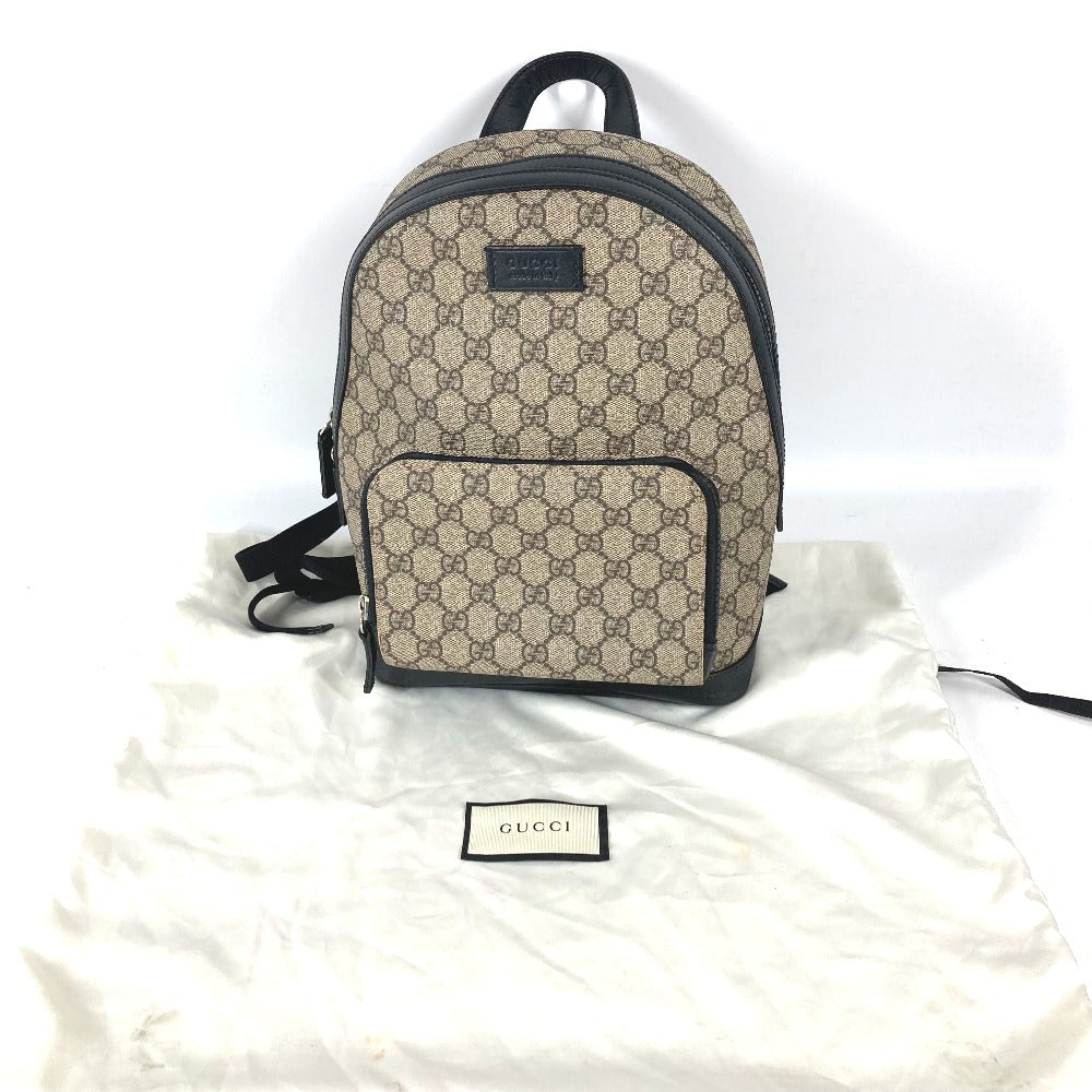Beige Gucci backpack on a white background