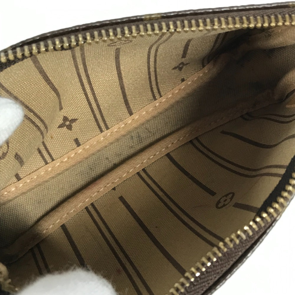 Close-up of a Louis Vuitton handbag interior with monogram pattern