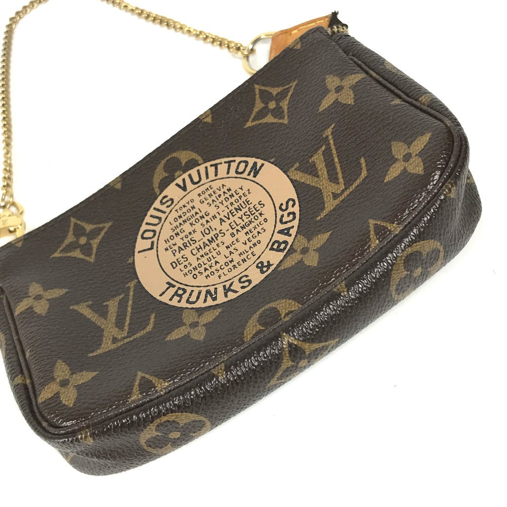 Louis Vuitton handbag with monogram pattern on a white background
