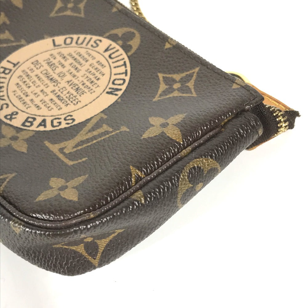 Louis Vuitton wallet with monogram pattern on a white background