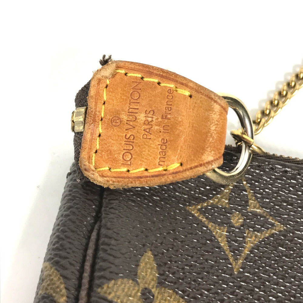 Close-up of a Louis Vuitton handbag with a visible brand label.