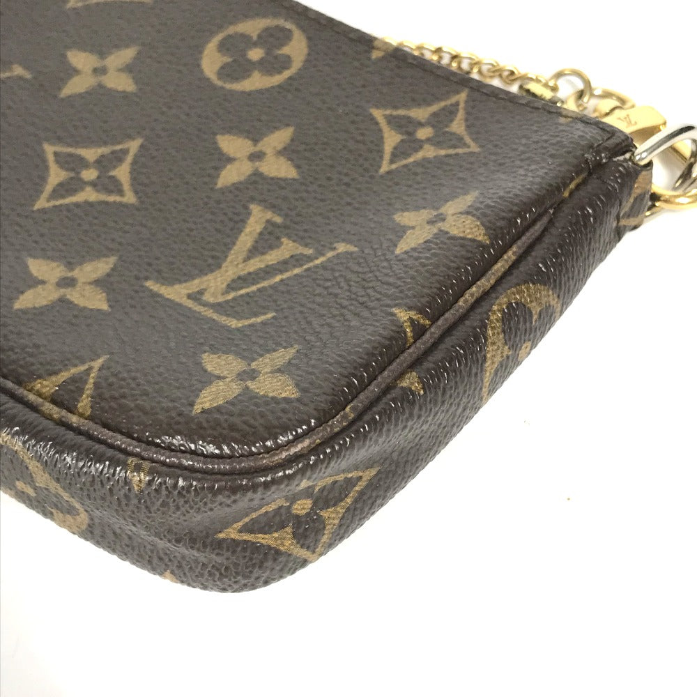 Louis Vuitton monogram wallet on a white background