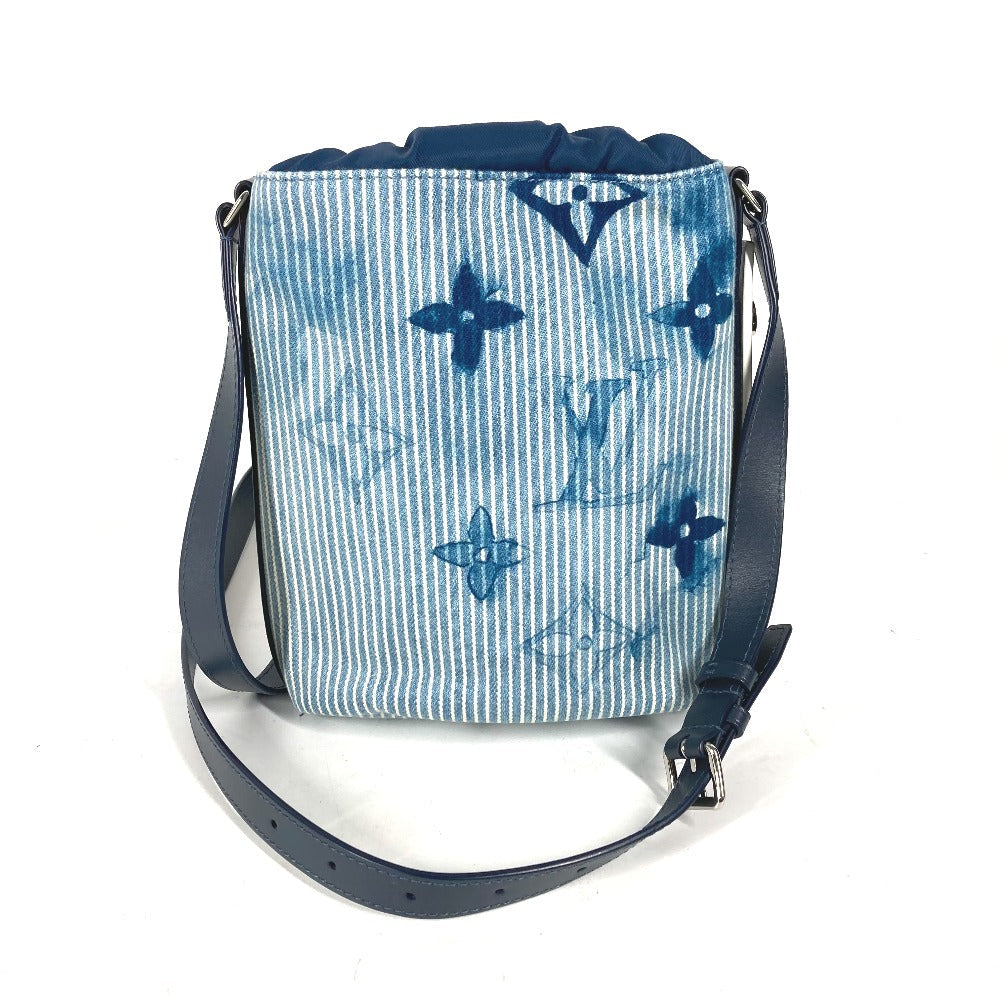 Blue and white patterned bag with a strap on a white background