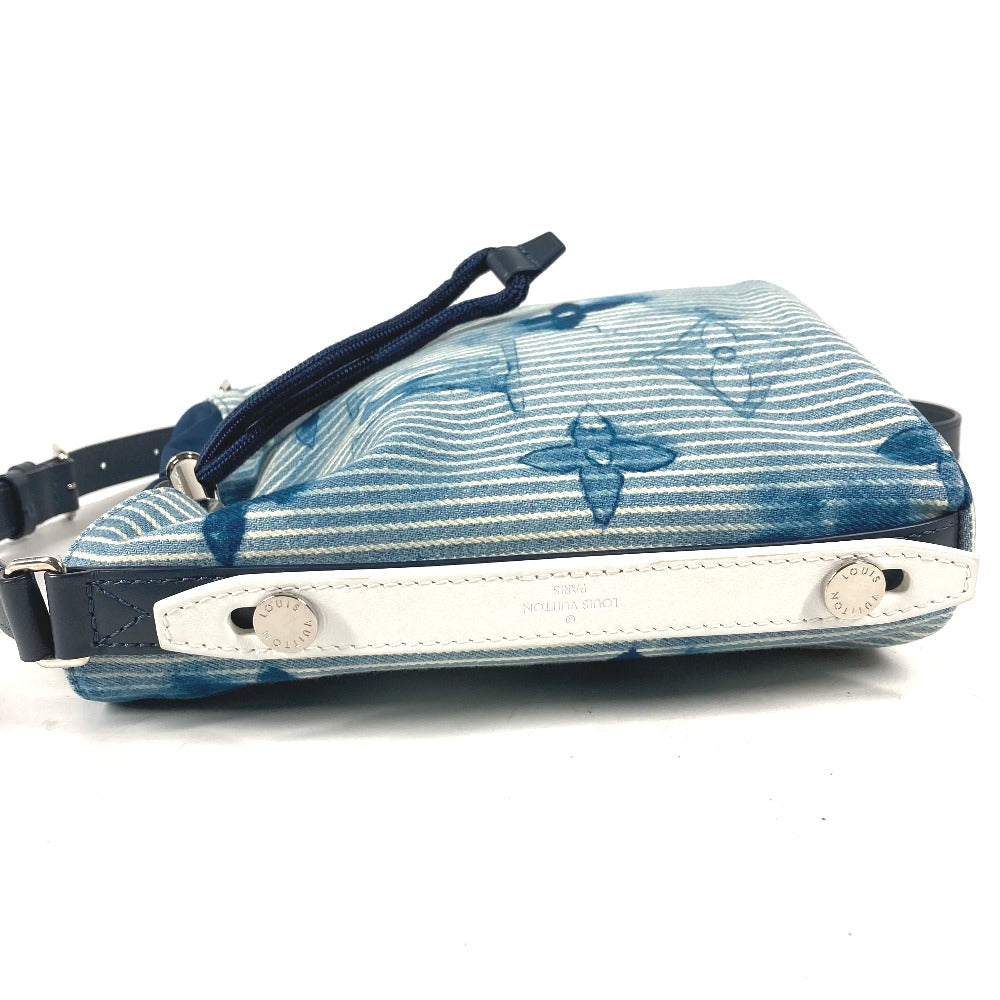 Blue and white patterned bag with a strap on a white background