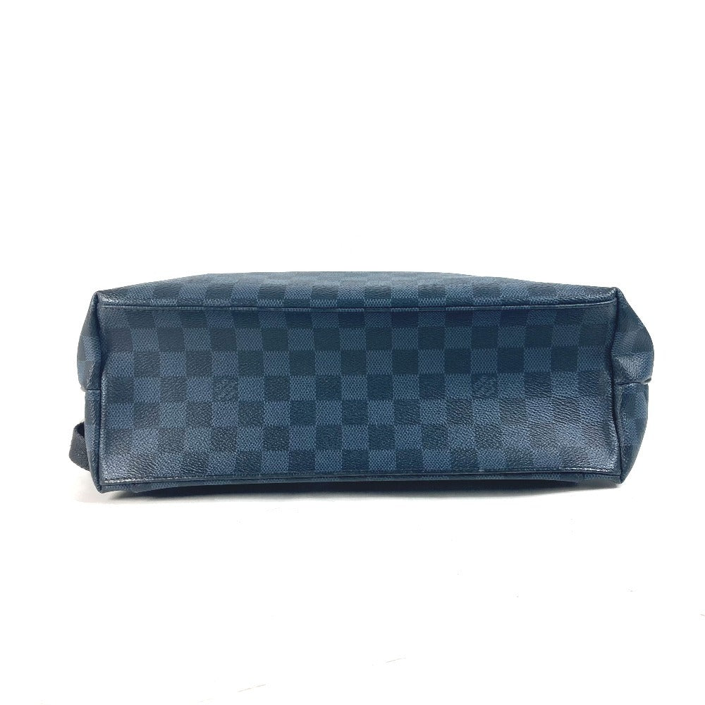 Blue checkered toiletry bag on a white background