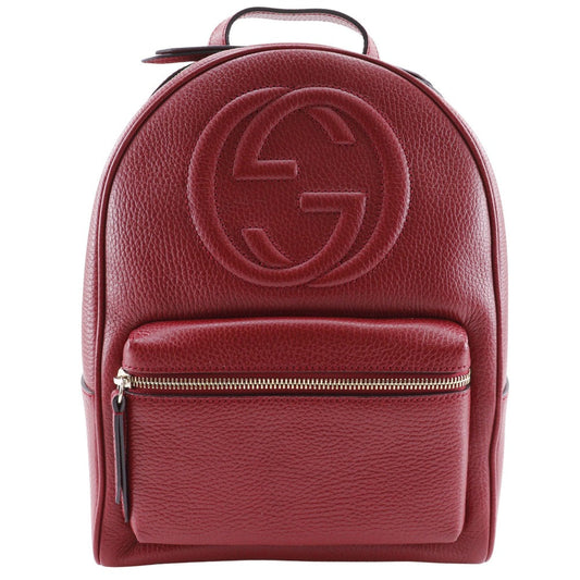 Red backpack with a brand logo on a white background