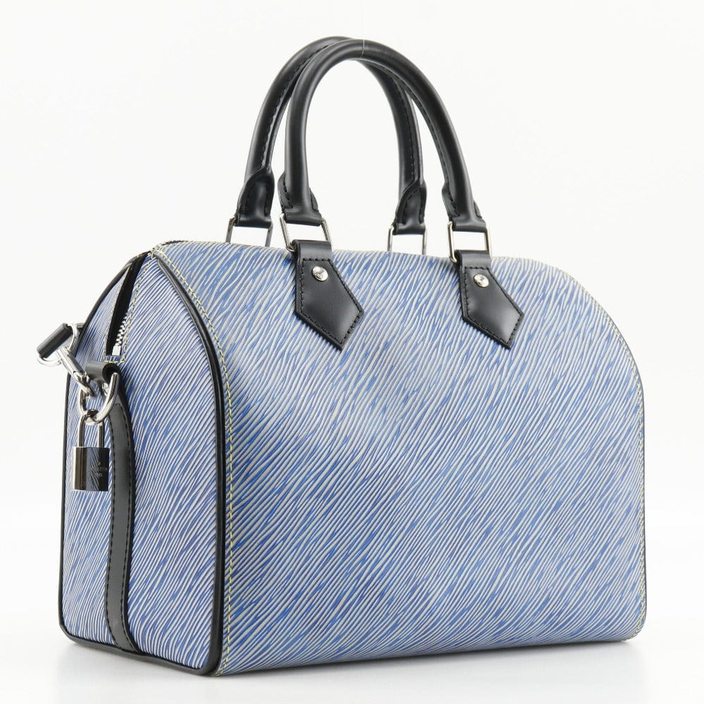 Blue handbag with black handles and accents on a white background