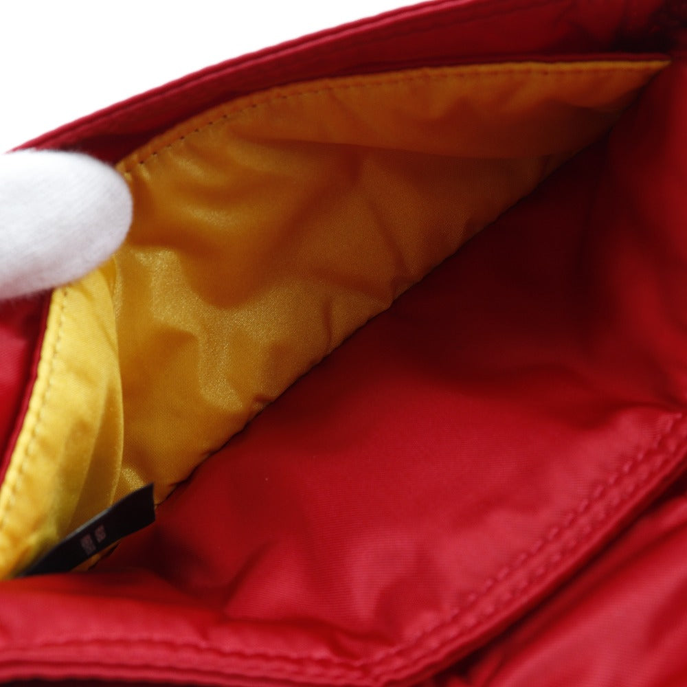 Close-up of a red jacket with yellow lining