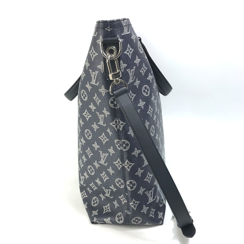 Designer handbag with monogram pattern on a white background