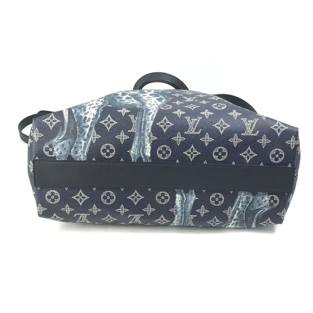 Blue duffel bag with white monogram pattern on a white background