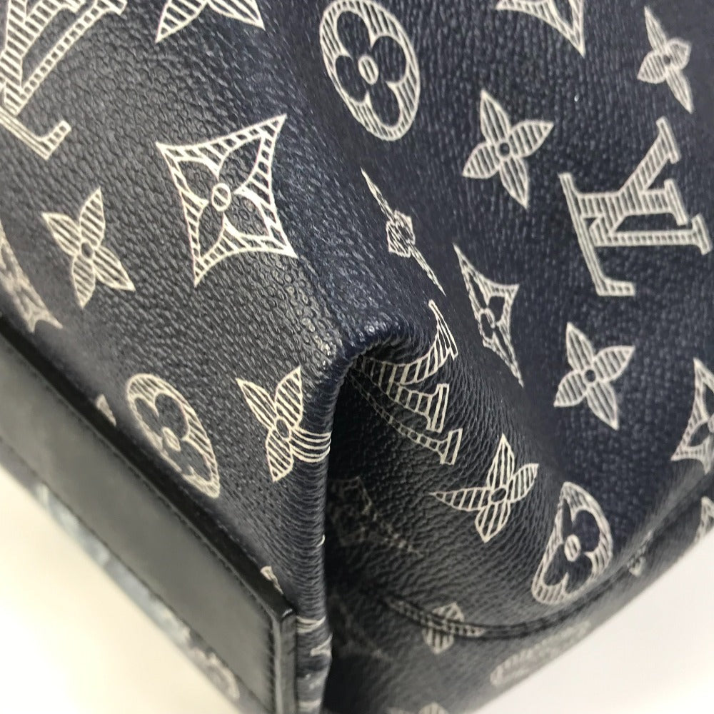 Close-up of a dark blue fabric with a white logo pattern on a white background