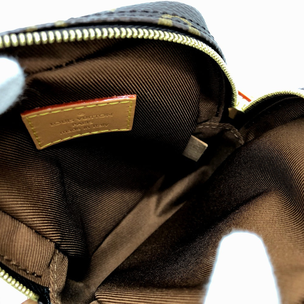 Close-up of a brown textured bag with a visible brand label on a white background