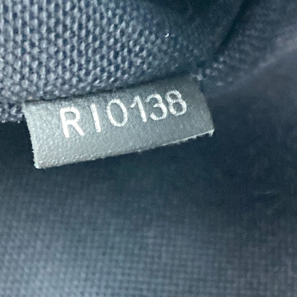 Text label with 'R10138' on a textured fabric background