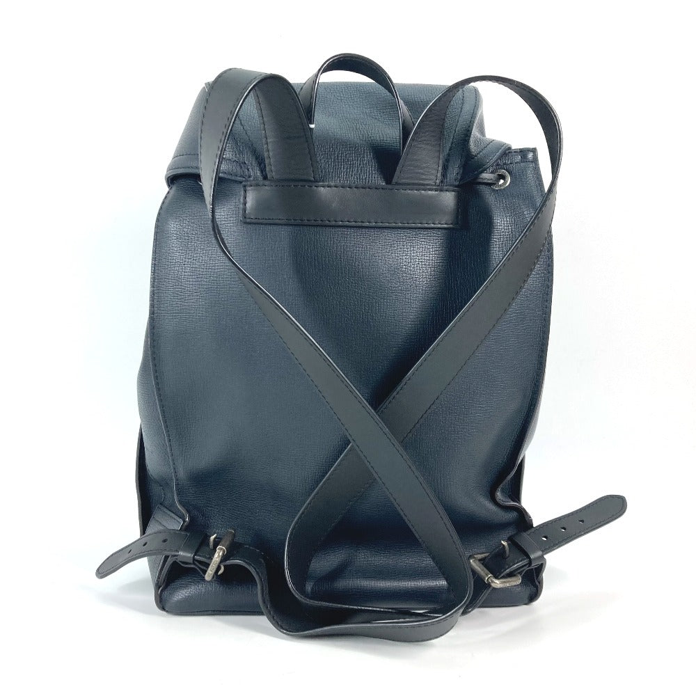 Blue leather backpack on a white background