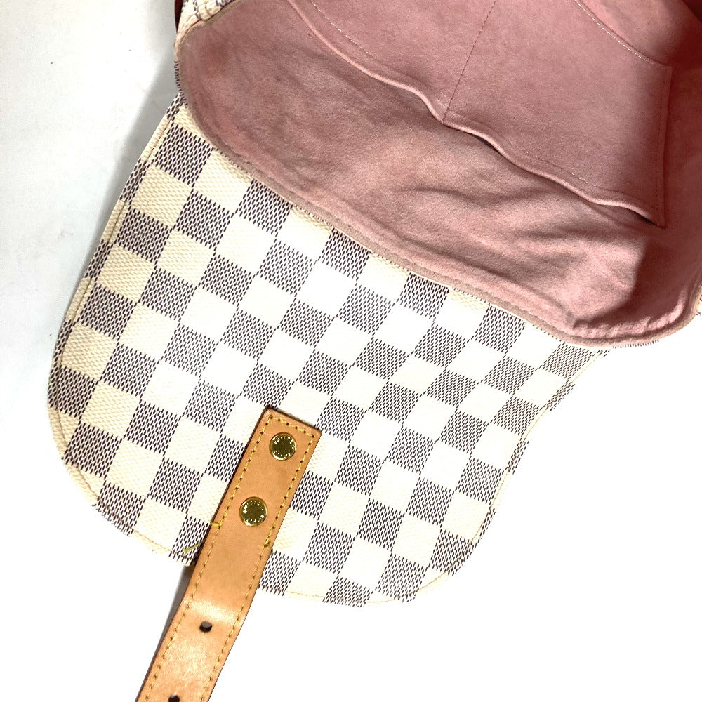 Checkered handbag with a pink interior on a white background