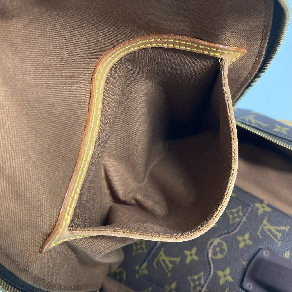 Close-up of a brown leather bag with visible stitching detail.