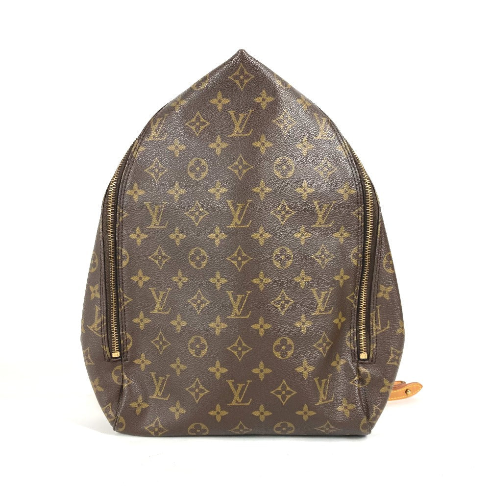 Brown backpack with gold monogram pattern on a white background