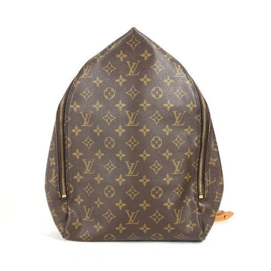 Brown backpack with gold monogram pattern on a white background