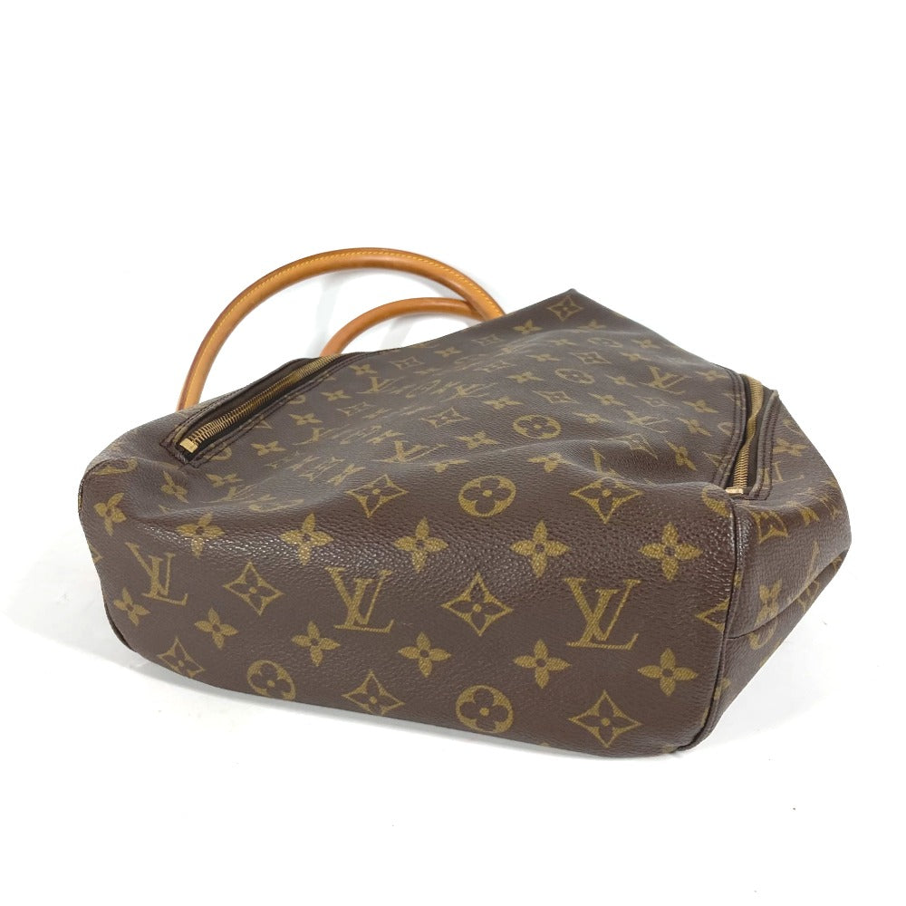 Brown Louis Vuitton handbag with monogram pattern on a white background