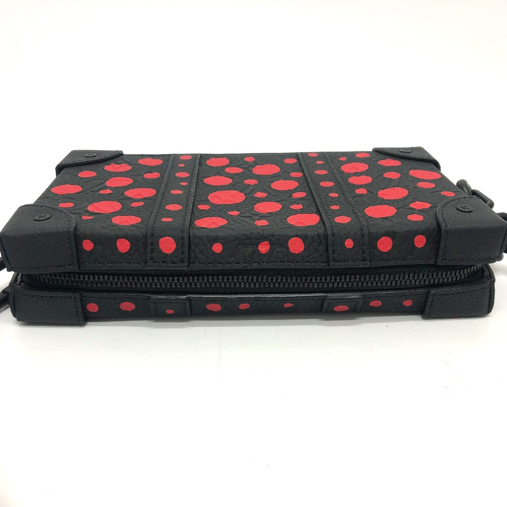 Black and red polka dot case on a white background