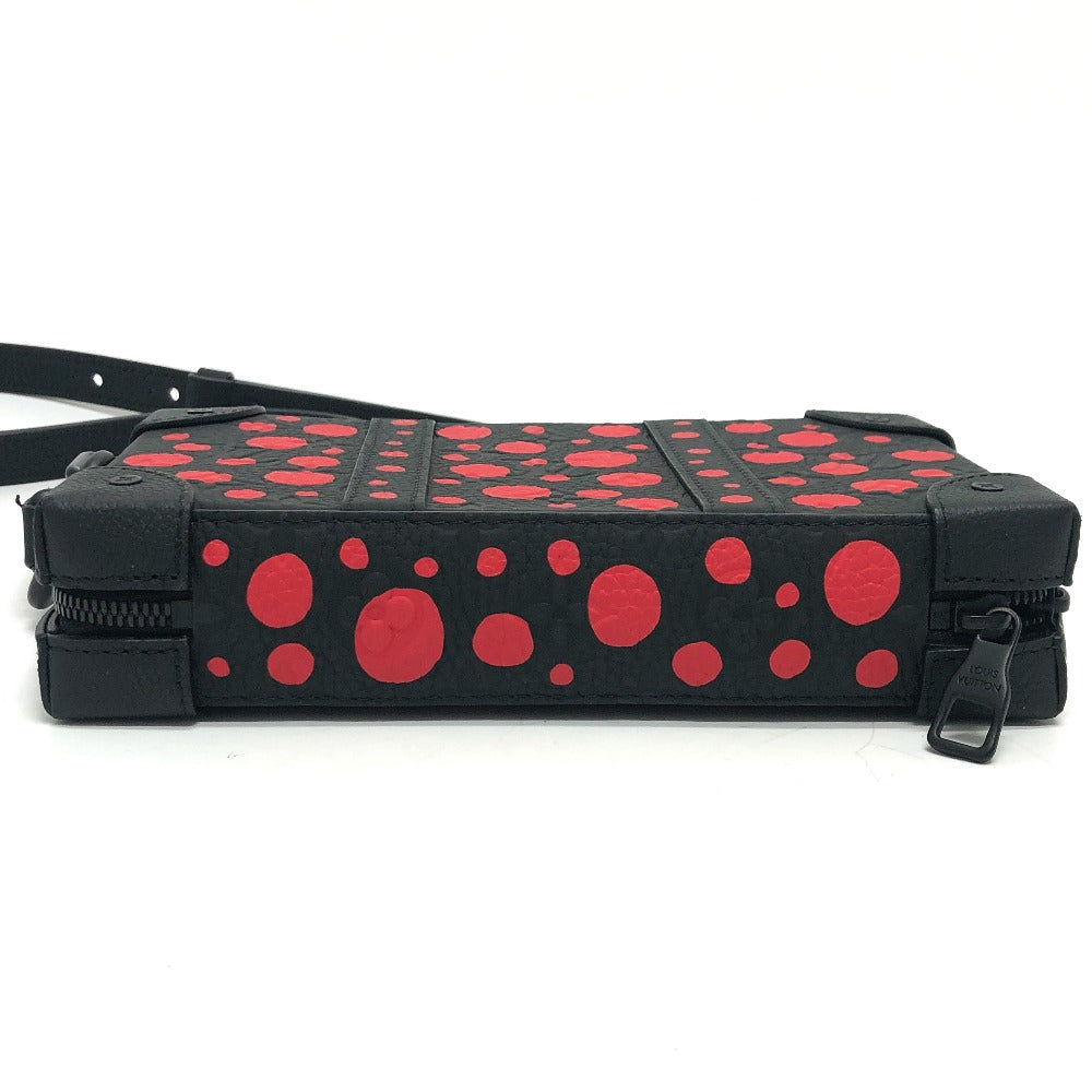 Black case with red polka dots on a white background