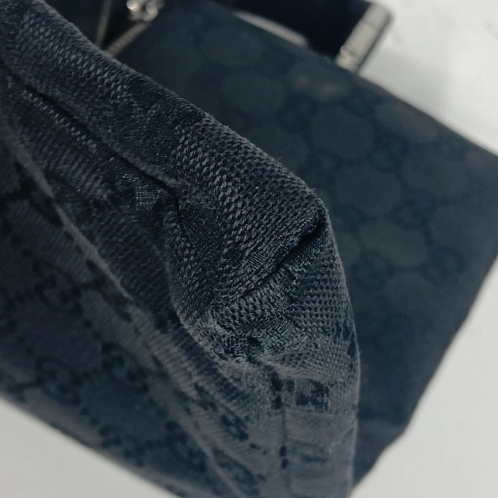 Close-up of a textured dark blue fabric with a pattern on a white background