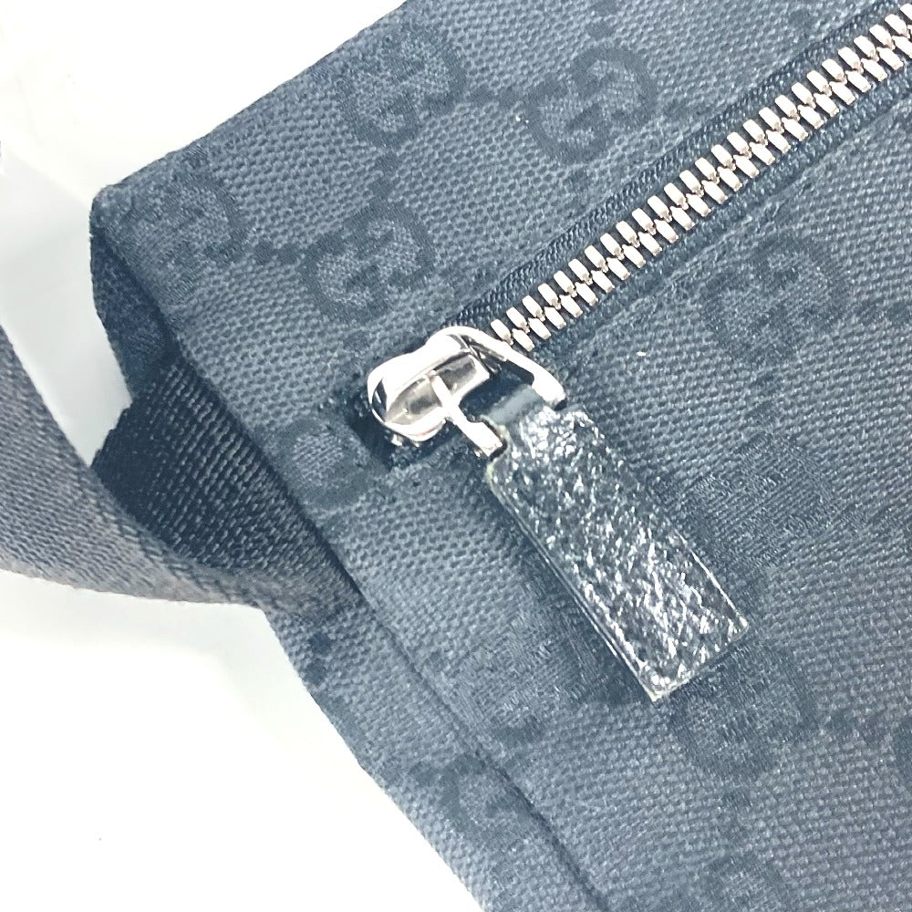 Close-up of a blue textured bag with a silver zipper on a white background