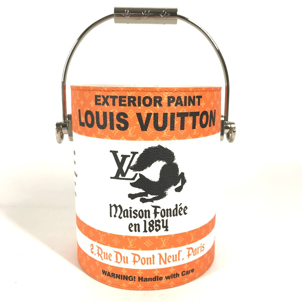 Louis Vuitton paint can with orange label on a white background