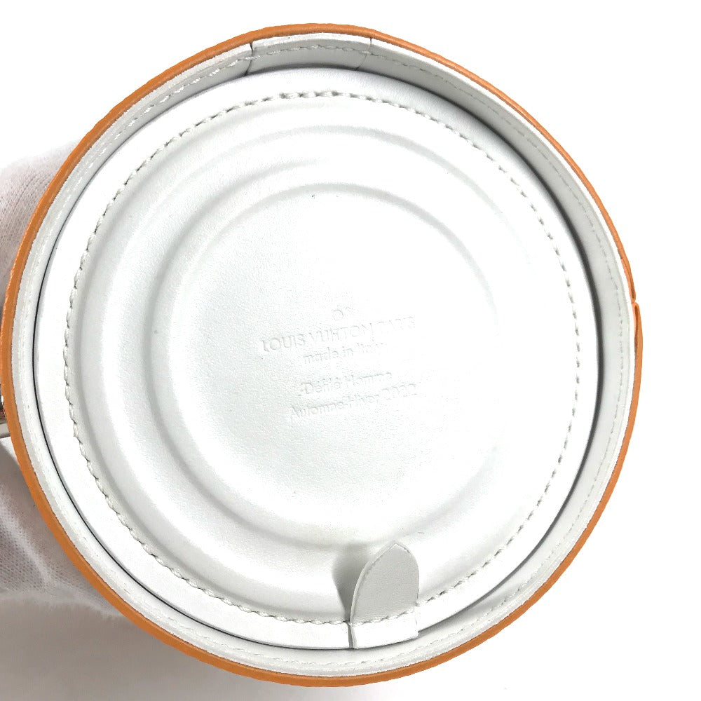 Close-up of a white lid with brown rim on a white background