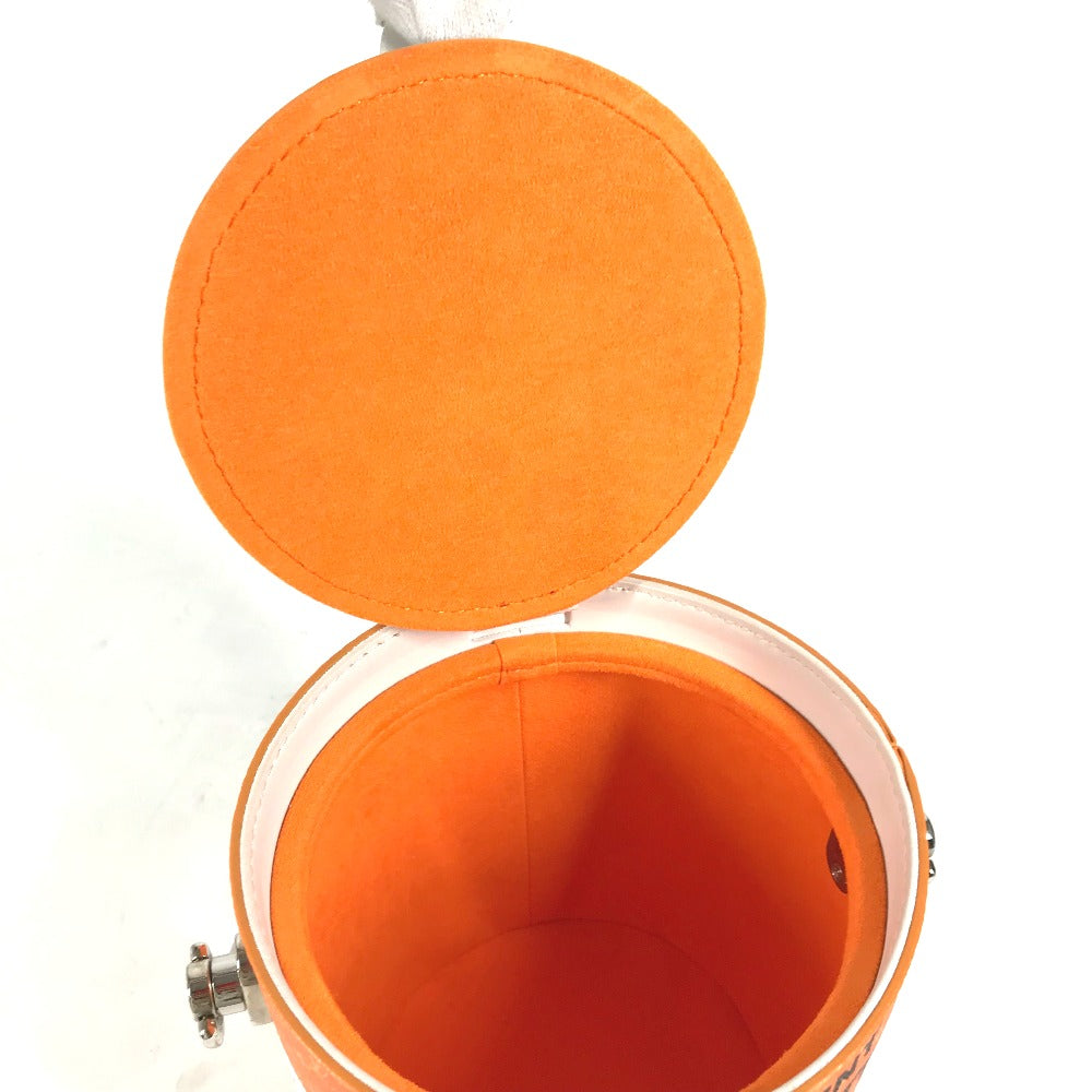 Orange bucket with a lid on a white background