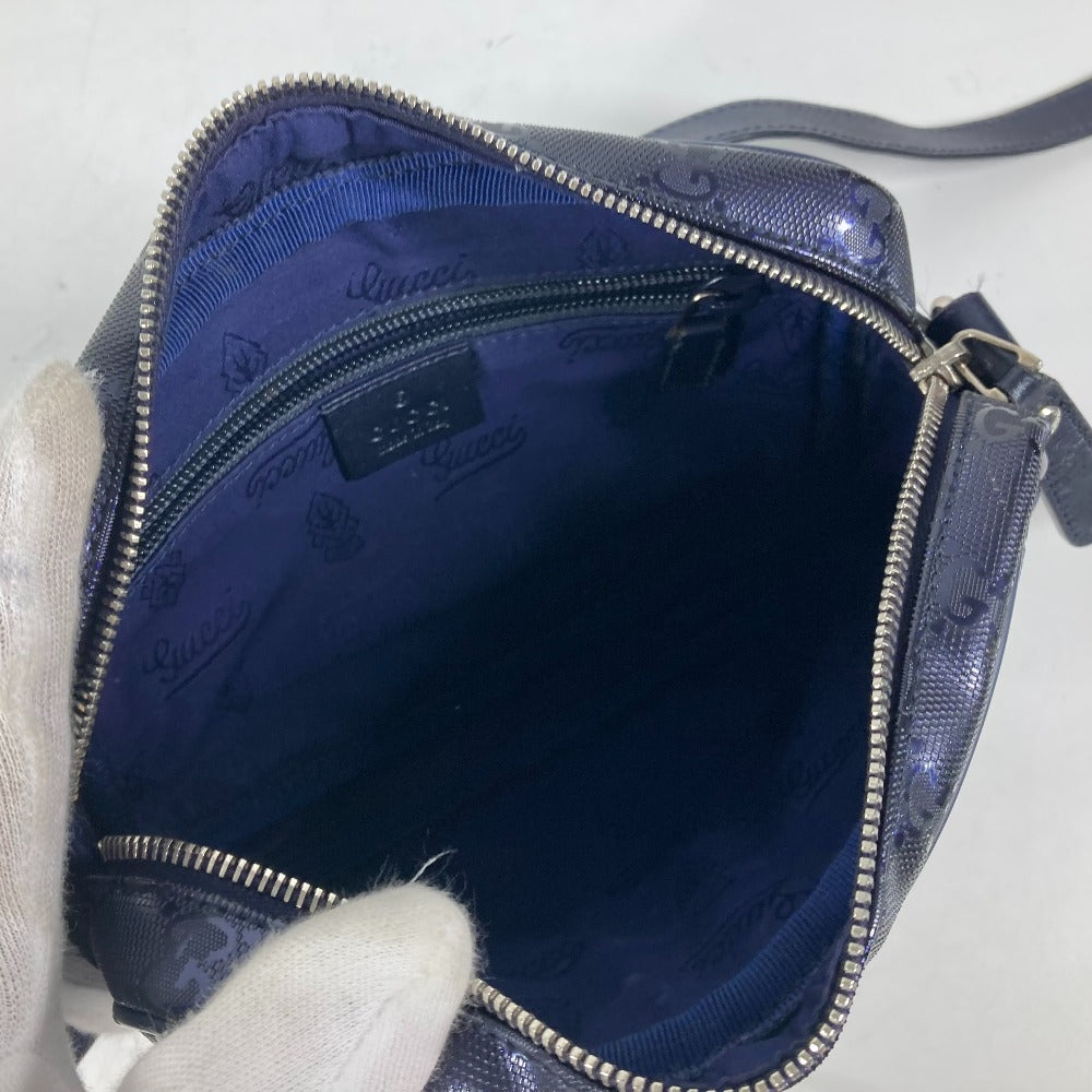 Blue handbag with visible brand logo on a white background