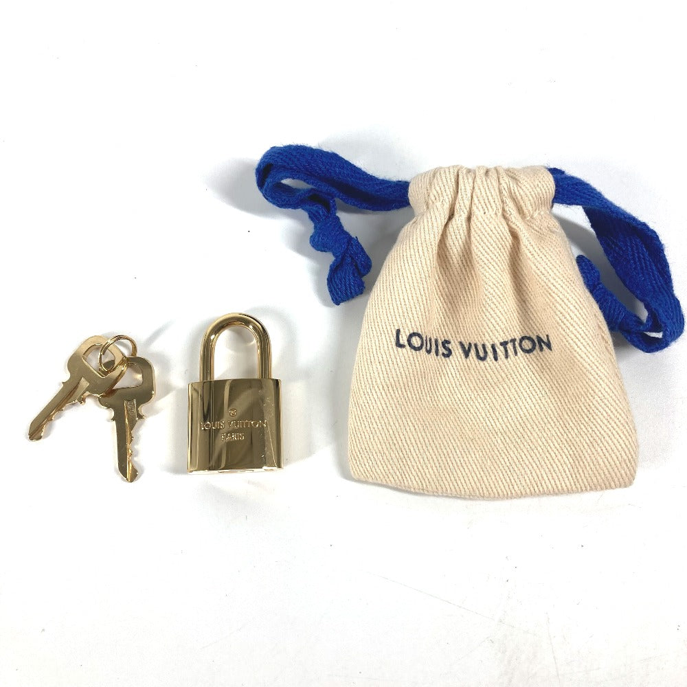 lock and keys Louis Vuitton Monogram Toupie