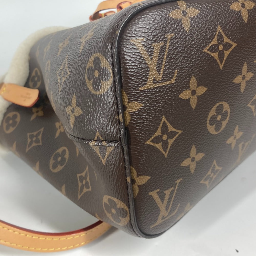Brown leather Louis Vuitton bag with monogram pattern on a white background