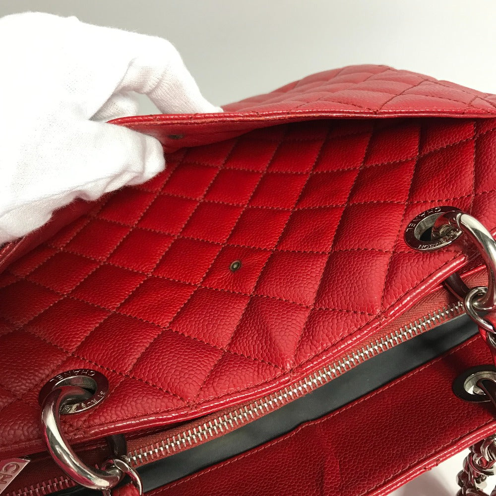 exterior pocket Chanel Caviar Quilted Grand Shopping Tote Red