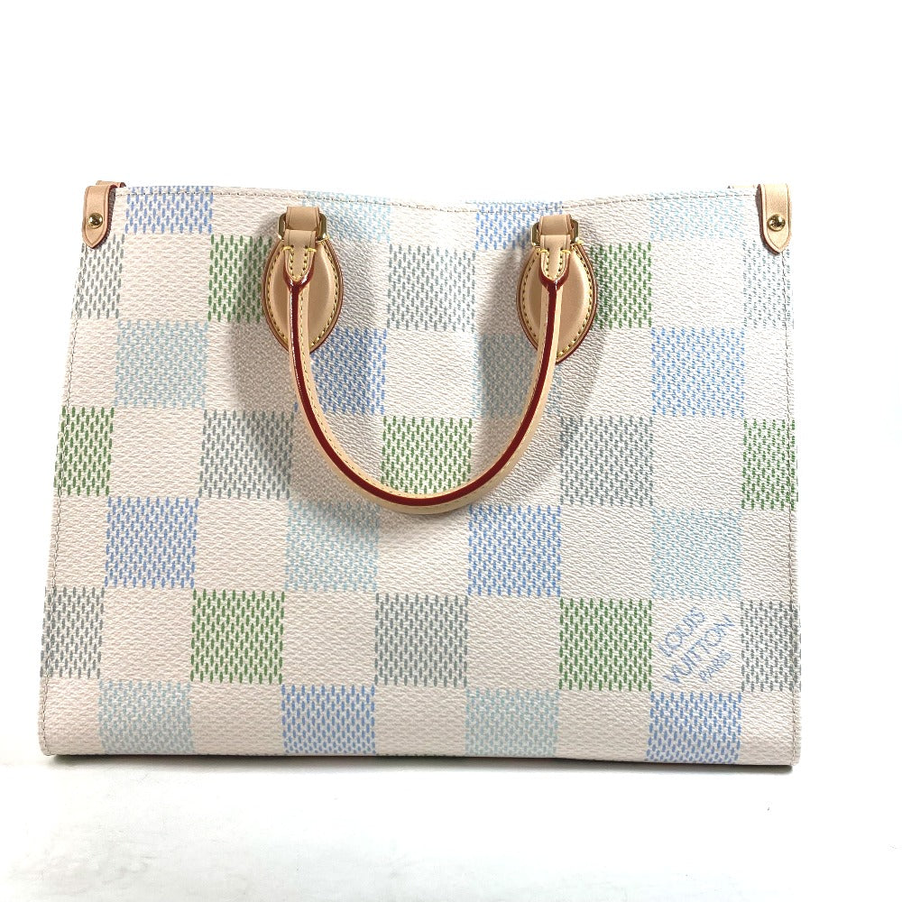 Designer handbag with checkered pattern on a white background