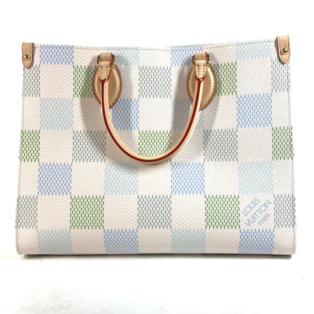 Checkered handbag with brown handles on a white background