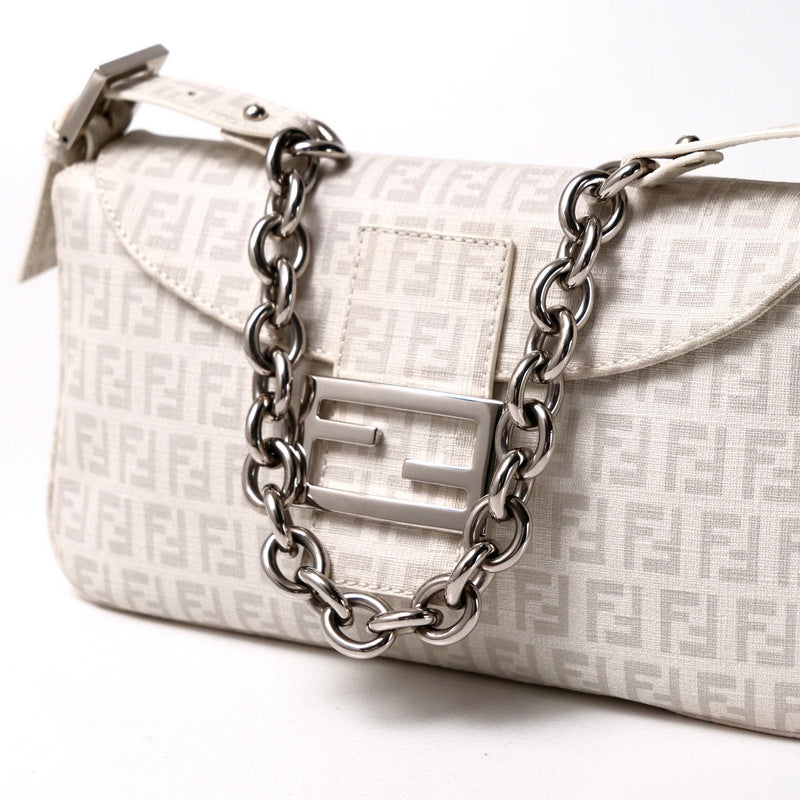 White handbag with silver chain and logo on a white background