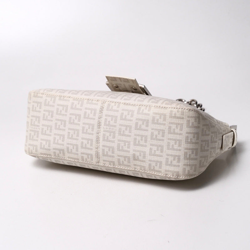 Beige patterned waist bag on a light gray background