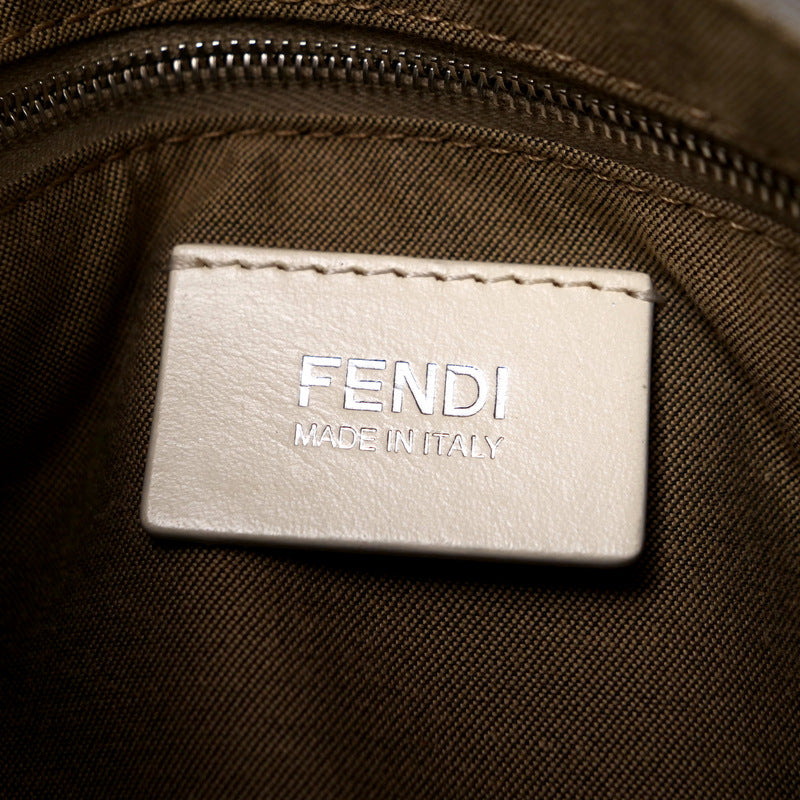 Fendi label on a brown fabric background